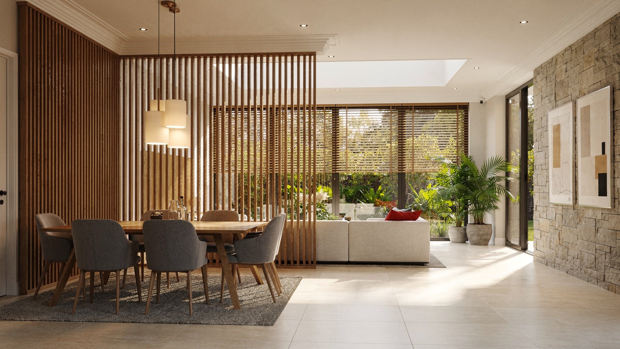A floor-to-ceiling wood slat screen dividing a dining area from a living space, with light and sightlines still passing through the gaps